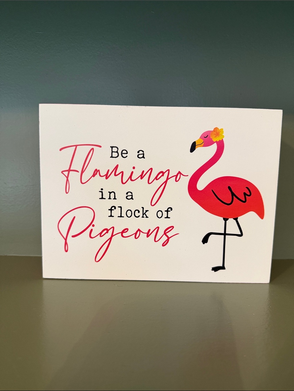 Be a Flamingo in a Flock of Pigeons Wall Sign